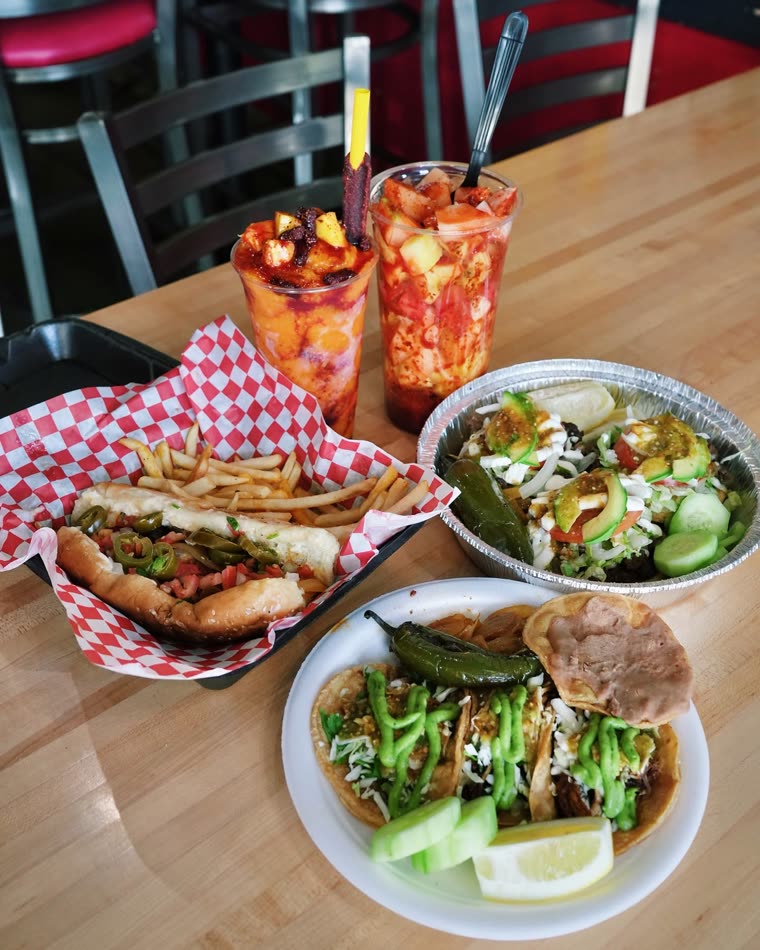 A spread of Taqueria Yarelis street food